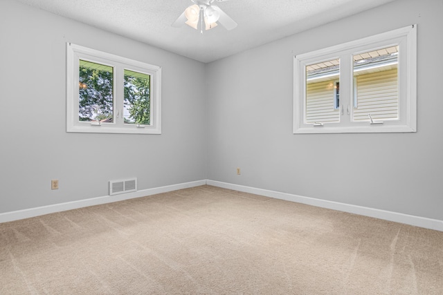8210 Red Oak Dr, Mounds View, MN 55112 - spare room featuring carpet floors and a ceiling fan