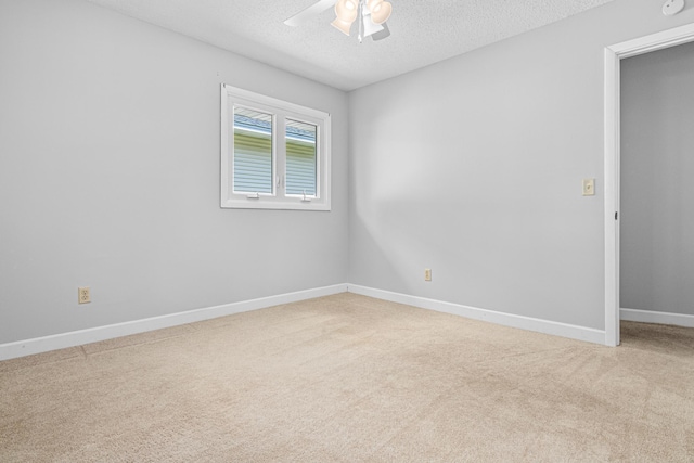 8210 Red Oak Dr, Mounds View, MN 55112 - carpeted spare room featuring ceiling fan and a textured ceiling