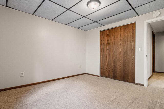8210 Red Oak Dr, Mounds View, MN 55112 - empty room with a paneled ceiling, carpet, and a smoke detector