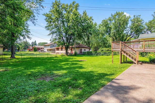 8210 Red Oak Dr, Mounds View, MN 55112 - view of yard with stairs and a wooden deck