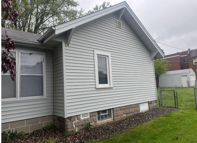 3815 Dupont Ave N, Minneapolis, MN 55412 - view of home's exterior featuring a gate
