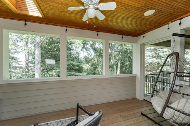 290 Wimbledon Hills Dr SW, Rochester, MN 55902 - sunroom featuring wooden ceiling, a ceiling fan, plenty of natural light, and wood finished floors