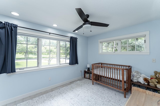 290 Wimbledon Hills Dr SW, Rochester, MN 55902 - bedroom with a nursery area, recessed lighting, and a ceiling fan