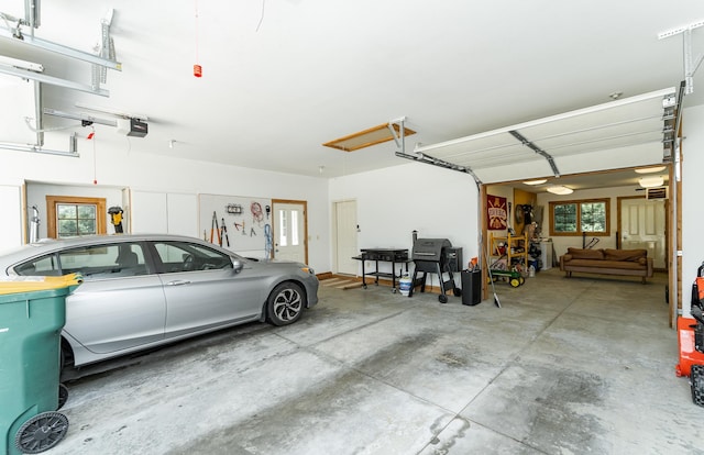 290 Wimbledon Hills Dr SW, Rochester, MN 55902 - garage with a garage door opener