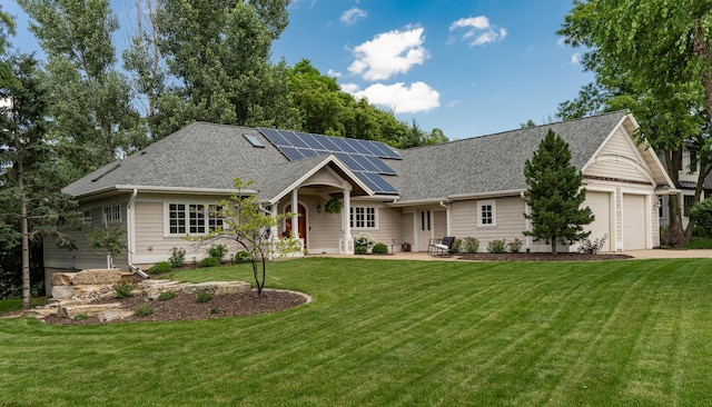290 Wimbledon Hills Dr SW, Rochester, MN 55902 - view of front of property with solar panels, a front yard, roof with shingles, and a garage