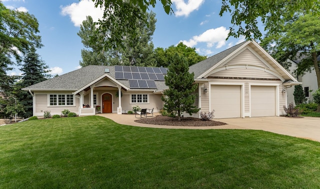 290 Wimbledon Hills Dr SW, Rochester, MN 55902 - single story home with concrete driveway, solar panels, a garage, a front yard, and roof with shingles