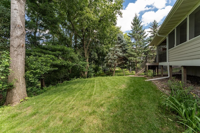 290 Wimbledon Hills Dr SW, Rochester, MN 55902 - view of grassy yard with stairs and a deck
