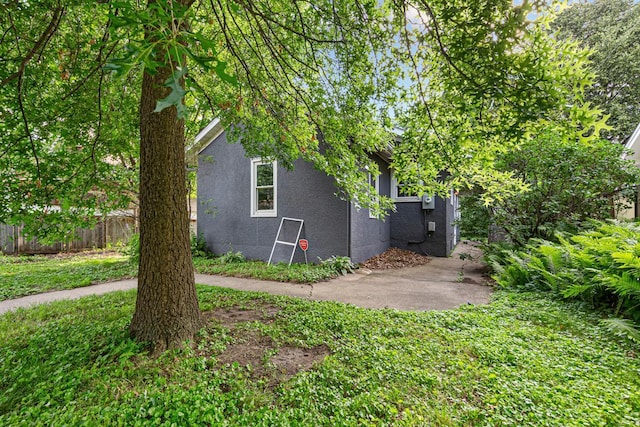 3233 42nd Ave S, Minneapolis, MN 55406 - view of side of home featuring stucco siding
