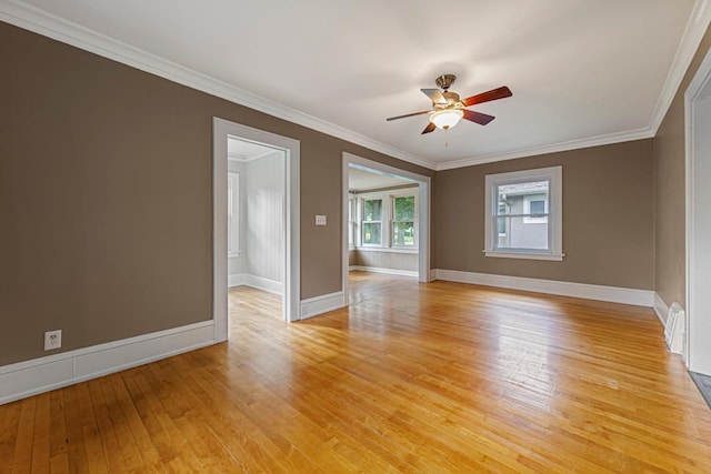 3233 42nd Ave S, Minneapolis, MN 55406 - empty room with light wood finished floors, a ceiling fan, and crown molding