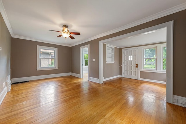 3233 42nd Ave S, Minneapolis, MN 55406 - empty room featuring light wood-style floors, a ceiling fan, and crown molding