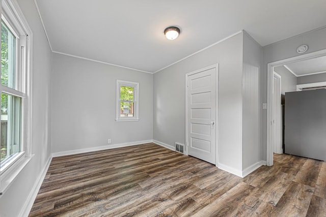 3233 42nd Ave S, Minneapolis, MN 55406 - unfurnished room with ornamental molding, dark wood-type flooring, and a smoke detector