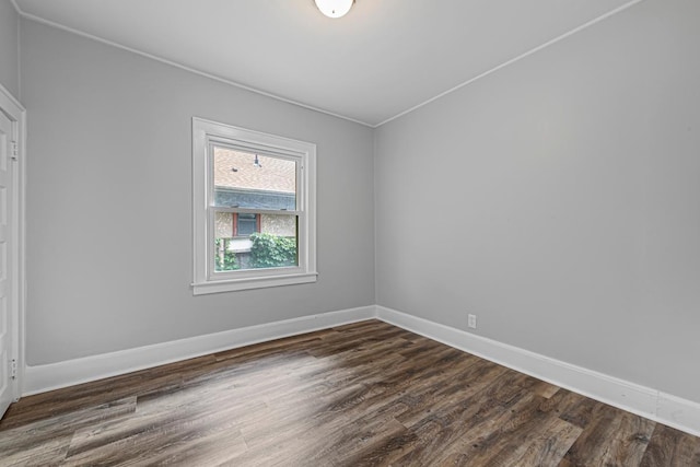 3233 42nd Ave S, Minneapolis, MN 55406 - empty room featuring dark wood-style flooring and crown molding