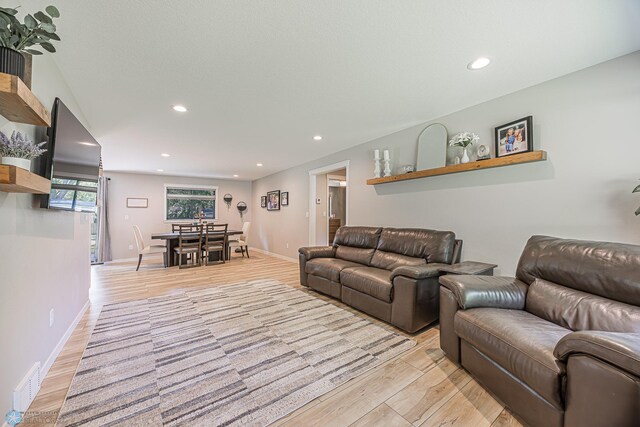 407 6th St NE, Barnesville, MN 56514 - living area featuring light wood-style flooring and recessed lighting