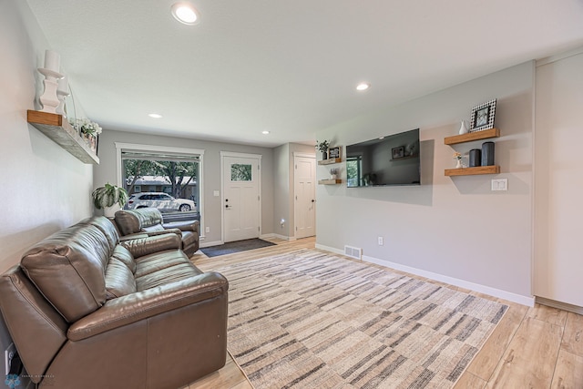 407 6th St NE, Barnesville, MN 56514 - living room featuring light wood-style floors and recessed lighting