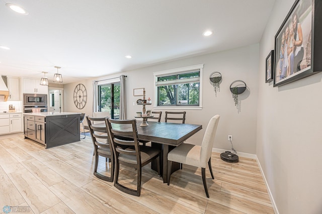 407 6th St NE, Barnesville, MN 56514 - dining space with light wood finished floors and recessed lighting