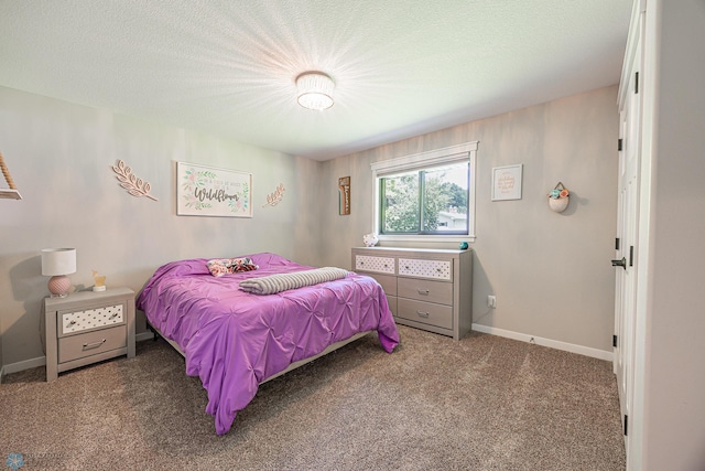 407 6th St NE, Barnesville, MN 56514 - carpeted bedroom with baseboards and a textured ceiling