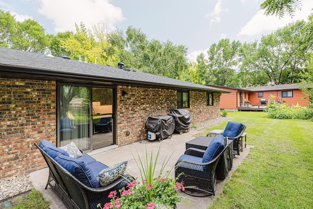 407 6th St NE, Barnesville, MN 56514 - view of patio with an outdoor living space, a grill, and a wooden deck