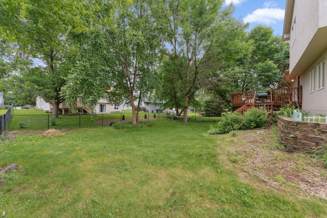 9055 Regent Pkwy, Brooklyn Park, MN 55443 - view of yard with a deck