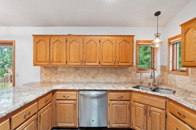 9055 Regent Pkwy, Brooklyn Park, MN 55443 - kitchen featuring stainless steel dishwasher, backsplash, light stone countertops, and brown cabinetry