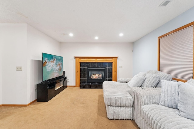 9055 Regent Pkwy, Brooklyn Park, MN 55443 - carpeted living area with a fireplace and recessed lighting
