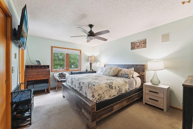 9055 Regent Pkwy, Brooklyn Park, MN 55443 - bedroom with carpet, a textured ceiling, and ceiling fan