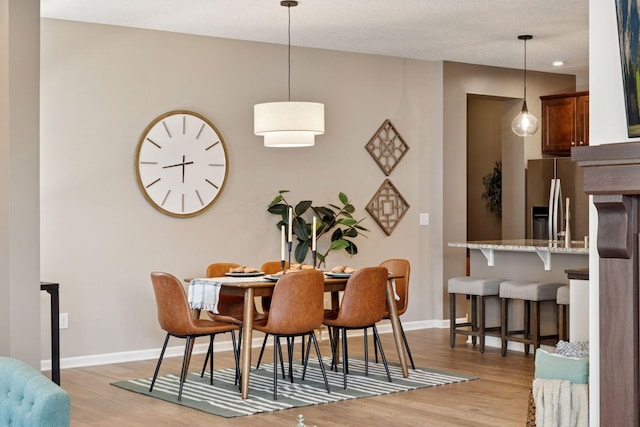 5053 Sunstream Ln, Woodbury, MN 55129 - dining room featuring light wood-style flooring