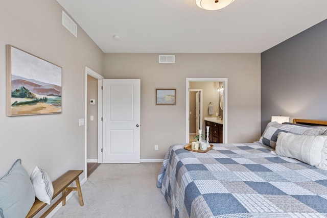 5053 Sunstream Ln, Woodbury, MN 55129 - bedroom featuring light colored carpet and ensuite bathroom