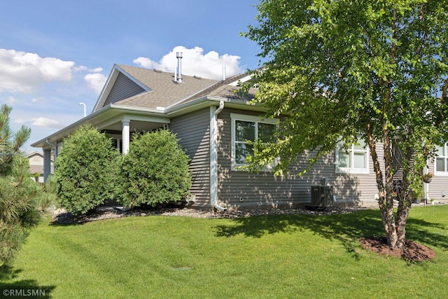 5053 Sunstream Ln, Woodbury, MN 55129 - view of side of property with a lawn and a shingled roof