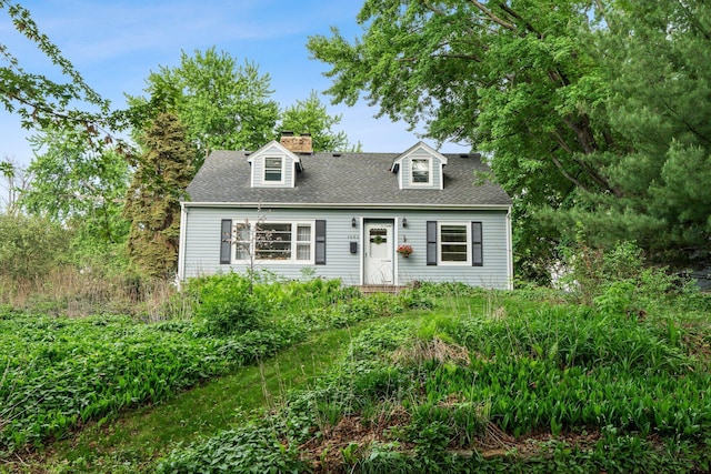1062 Ohio St, West Saint Paul, MN 55118 - new england style home featuring roof with shingles and a chimney