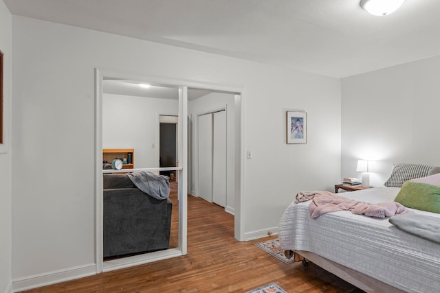 1062 Ohio St, West Saint Paul, MN 55118 - bedroom with wood finished floors and baseboards