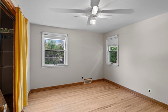 1062 Ohio St, West Saint Paul, MN 55118 - unfurnished bedroom with light wood-style floors and ceiling fan