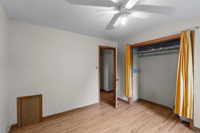 1062 Ohio St, West Saint Paul, MN 55118 - unfurnished bedroom featuring light wood finished floors, a closet, and a ceiling fan
