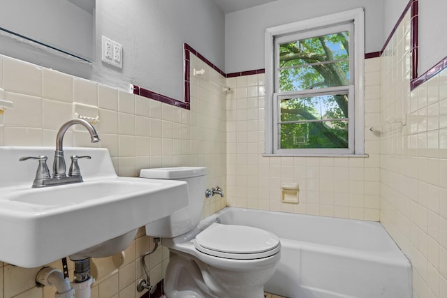1062 Ohio St, West Saint Paul, MN 55118 - bathroom featuring tile walls and shower / bath combination