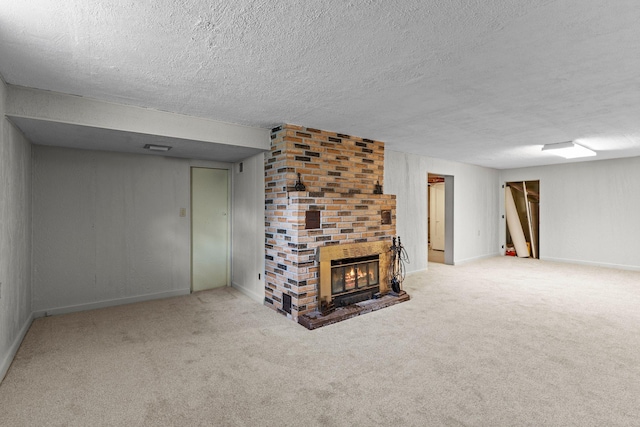 1062 Ohio St, West Saint Paul, MN 55118 - finished basement with carpet flooring, a brick fireplace, and a textured ceiling
