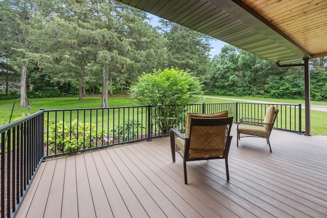 13326 Mallard Dr SE, Becker Twp, MN 55308 - wooden deck with view of scattered trees and a lawn