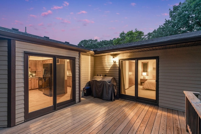 13326 Mallard Dr SE, Becker Twp, MN 55308 - deck at dusk with grilling area
