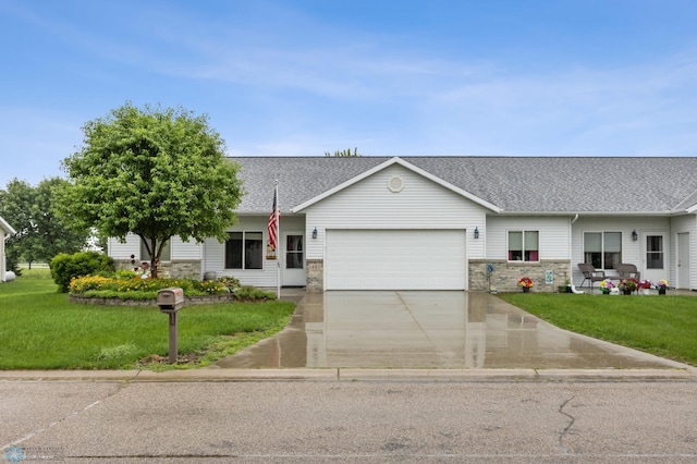 1403 2nd Ave NE, Barnesville, MN 56514 - view of front of house featuring a garage, a front yard, driveway, and a shingled roof