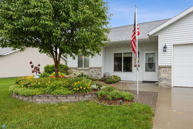1403 2nd Ave NE, Barnesville, MN 56514 - view of front of house with roof with shingles and brick siding