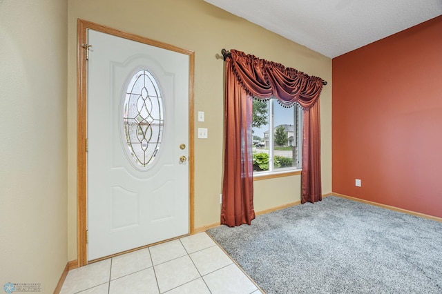 1403 2nd Ave NE, Barnesville, MN 56514 - entryway featuring light tile patterned flooring and baseboards