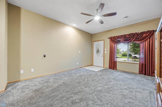 1403 2nd Ave NE, Barnesville, MN 56514 - unfurnished room featuring ceiling fan, light carpet, a textured ceiling, and a smoke detector