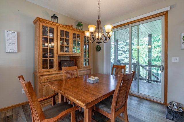 406 13th Ave NW, Kasson, MN 55944 - dining room featuring wood finished floors and a chandelier