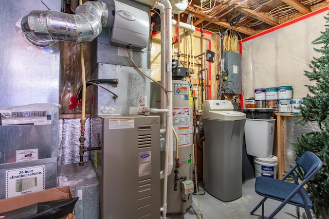 406 13th Ave NW, Kasson, MN 55944 - utility room featuring electric panel and gas water heater
