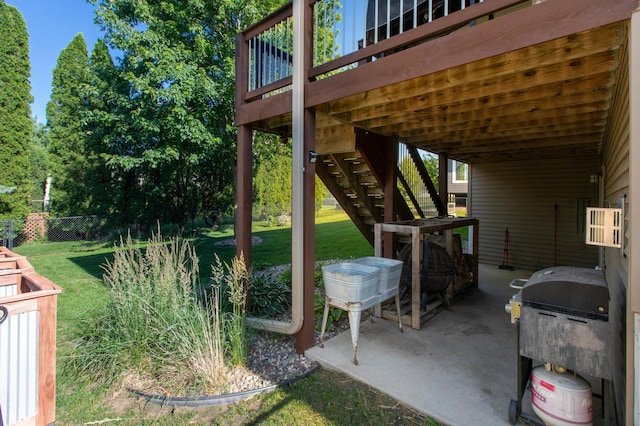 406 13th Ave NW, Kasson, MN 55944 - view of yard featuring stairs, a wooden deck, and a patio