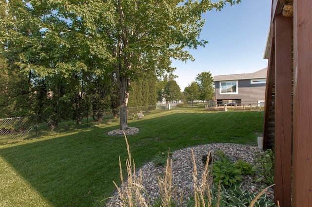406 13th Ave NW, Kasson, MN 55944 - fenced backyard with a vegetable garden