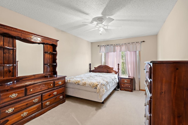 4543 Bloomberg Cir, Inver Grove Heights, MN 55076 - bedroom featuring light colored carpet, a textured ceiling, and a ceiling fan