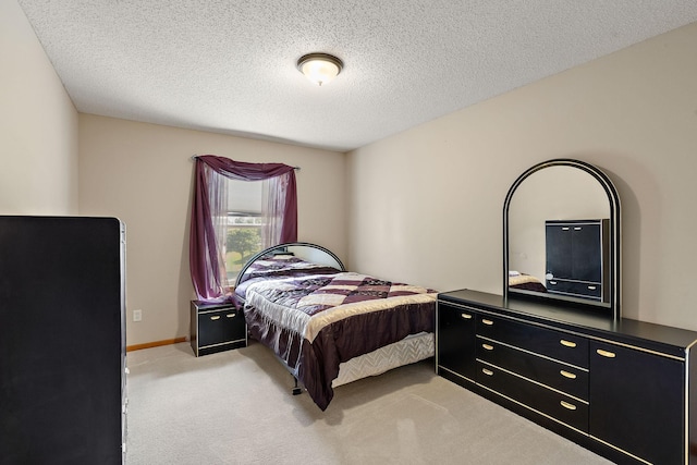 4543 Bloomberg Cir, Inver Grove Heights, MN 55076 - bedroom with light colored carpet and a textured ceiling