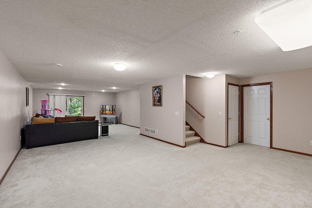 4543 Bloomberg Cir, Inver Grove Heights, MN 55076 - living room with stairway, light colored carpet, and a textured ceiling