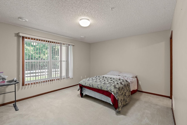 4543 Bloomberg Cir, Inver Grove Heights, MN 55076 - bedroom with carpet and a textured ceiling