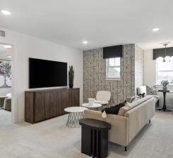 14560 106th Pl N, Maple Grove, MN 55369 - living room with recessed lighting, light carpet, and an accent wall