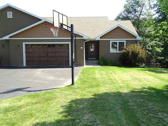 224 Country Ln, Durand, WI 54736 - view of front of home with an attached garage, driveway, roof with shingles, and a front lawn